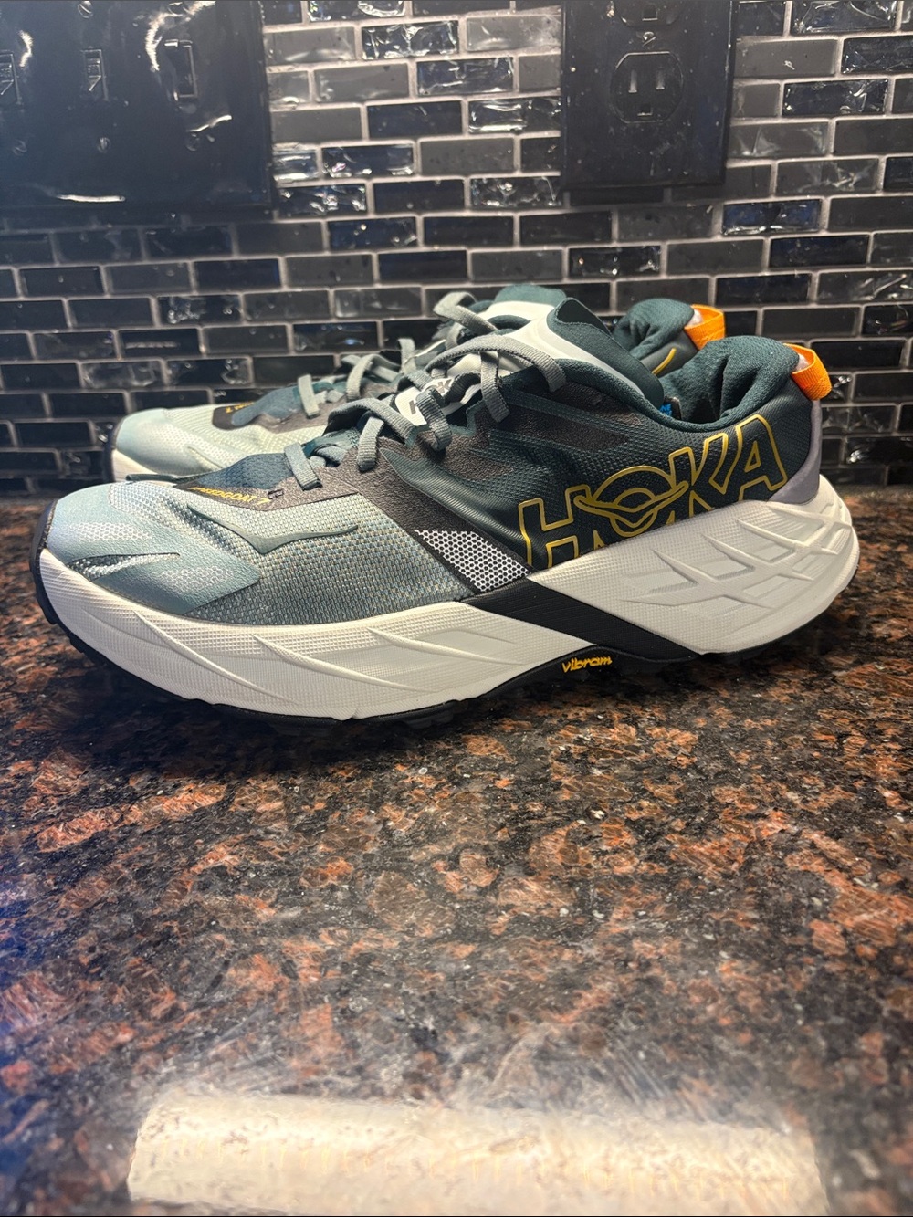 Hoka Speedgoat 7 Men's Running Shoe - green with Orange Accents